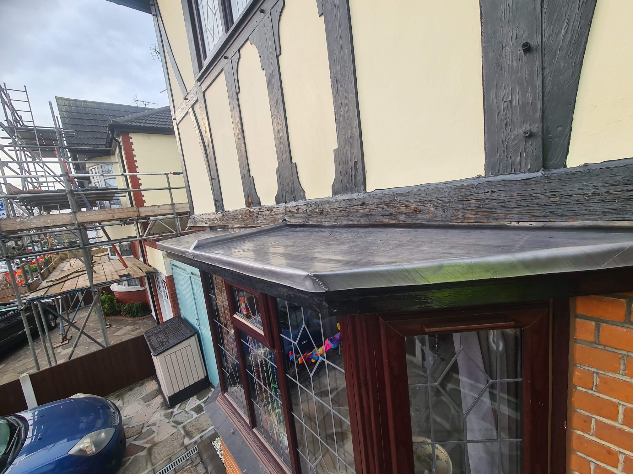 MJP roofer working on slate